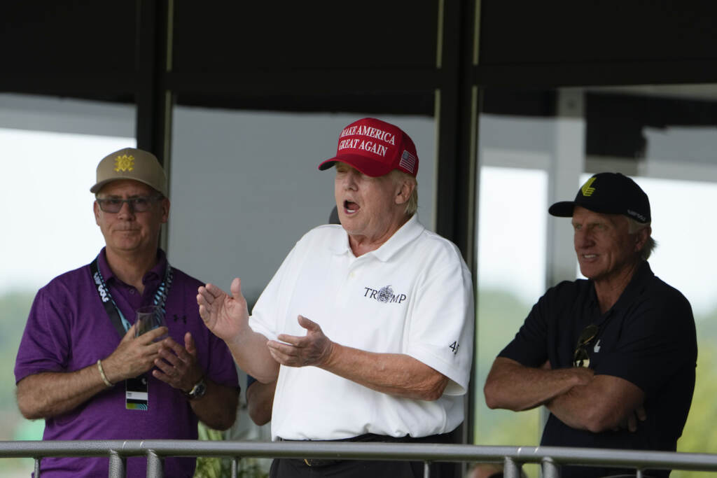 Donald Trump, Greg Norman, Paul Myler Donald Trump at the golf course