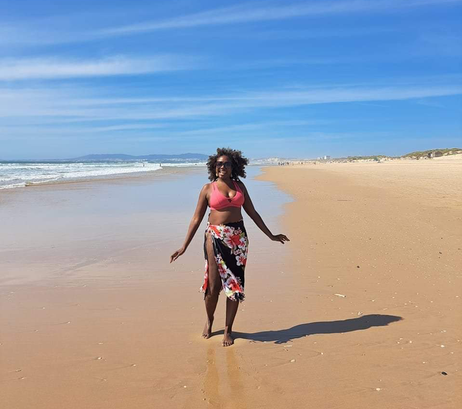 Twanna Hines on a beach