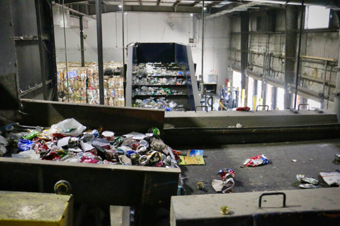 A view from above of conveyor belts sorting recycled materials.