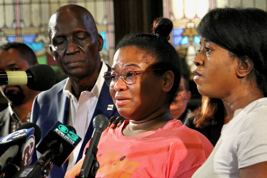 2023 07 05-e lee-josephine wamah jasmin wamah-philadelphia kingsessing-mass shooting Josephine Wamah (center) and Jasmine Wamah, sisters of shooting victim Joseph Wamah Jr., 31, share their feelings during a press conference at the Salt and Light Church in Kingsessing.