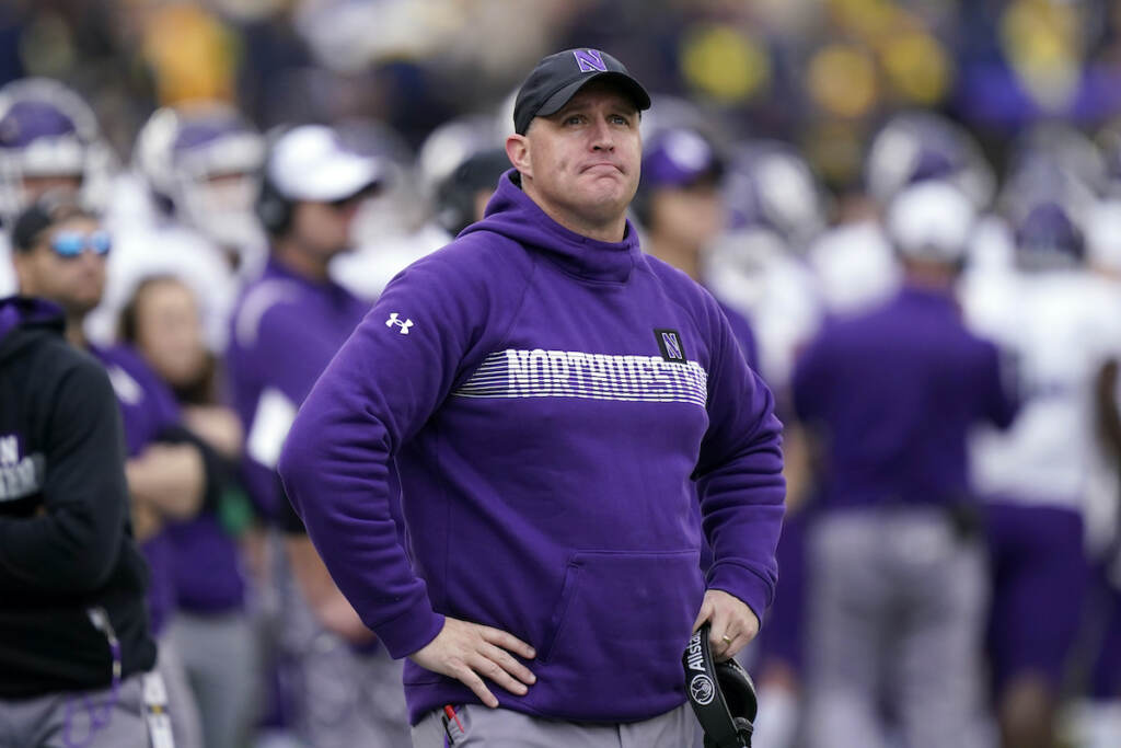 Pat Fitzgerald File photo: Northwestern head coach Pat Fitzgerald stands on the sideline during the first half of an NCAA college football game against Michigan, Oct. 23, 2021, in Ann Arbor, Mich.