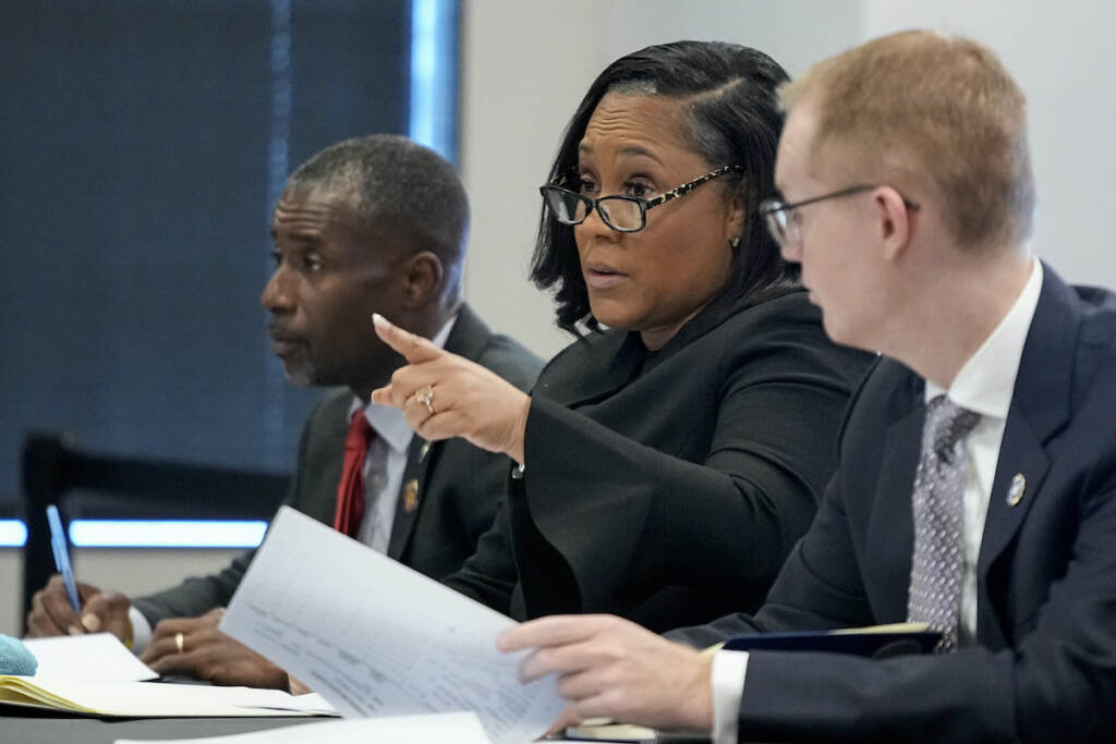 Georgia Election Investigation Fulton County District Attorney Fani Willis speaks in court in the Fulton county courthouse, Tuesday, July 11, 2023, in Atlanta. A grand jury being seated Tuesday in Atlanta will likely consider whether criminal charges are appropriate for former President Donald Trump or his Republican allies for their efforts to overturn his 2020 election loss in Georgia.