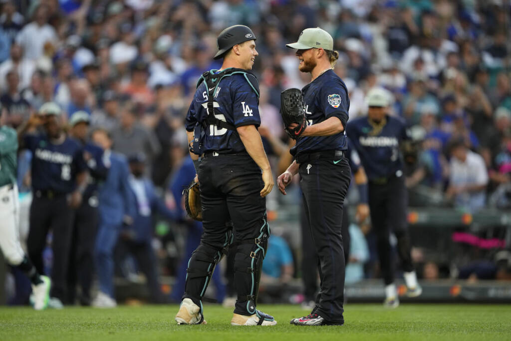 All Star Game Baseball National League catcher Will Smith (16), of the Los Angeles Dodgers, greets Craig Kimbrel, of the Philadelphia Phillies, after defeating the American League 3-2 in the MLB All-Star baseball game in Seattle, Tuesday, July 11, 2023