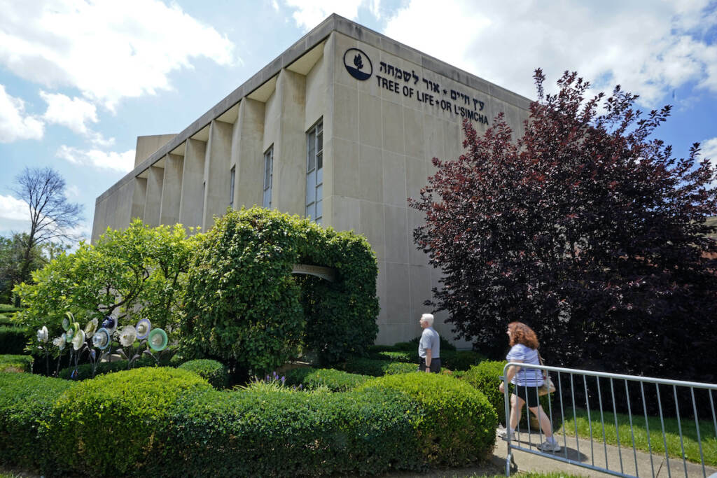 Pittsburgh Synagogue Shooting People walk outside the dormant landmark Tree of Life synagogue in Pittsburgh's Squirrel Hill neighborhood on Thursday, July 13, 2023, the day a federal jury announced they had found Robert Bowers, who in 2018 killed 11 people at the synagogue, eligible for the death penalty