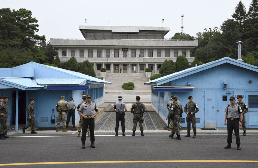 North Korea US Soldiers of South Korea and the U.S. stand guard during a commemorative ceremony for the 64th anniversary of the signing of the Korean War Armistice Agreement at the truce village of Panmunjom in the Demilitarized Zone (DMZ) dividing the two Koreas, on July 27, 2017.