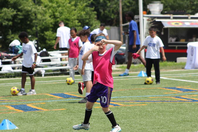 Kids picked up goal celebrations while training with Chelsea FC staff at Cristo Rey Philadelphia High School on July 24, 2023