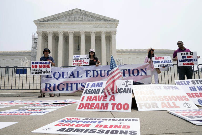 People protest outside of the Supreme Court in Washington