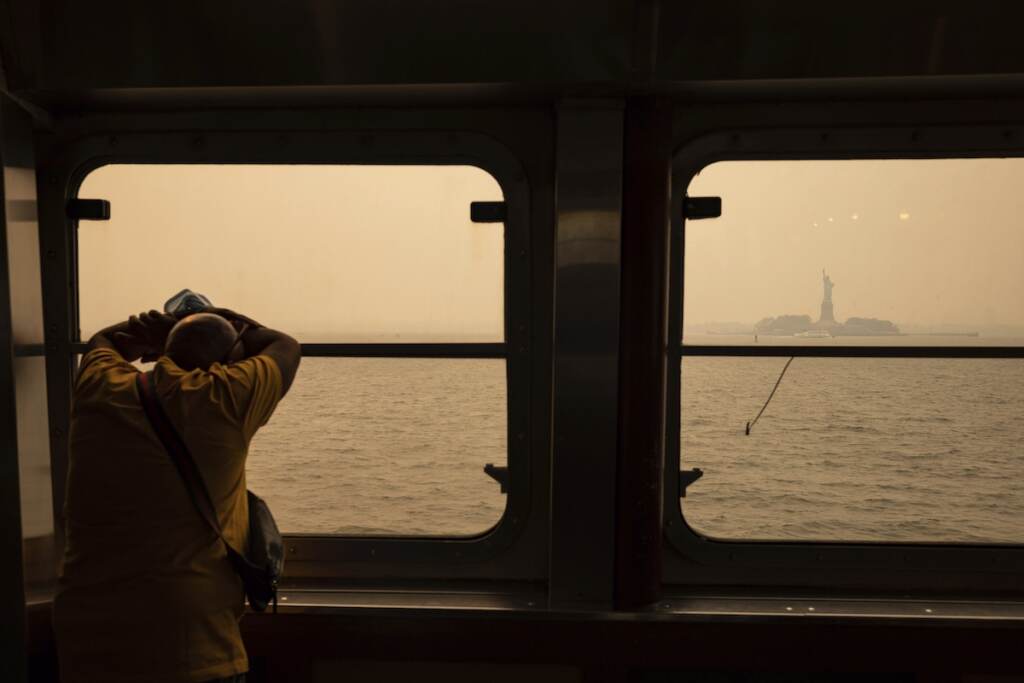 Canada Wildfires The New Abnormal The Statue of Liberty, covered in a haze