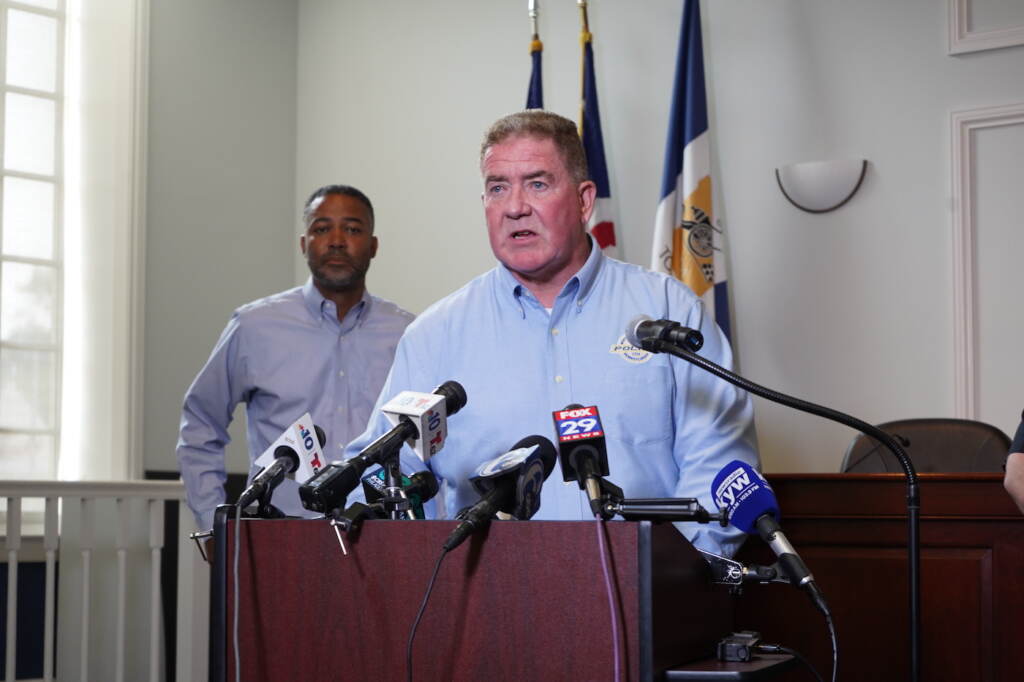 Christopher Ward speaking at a podium.