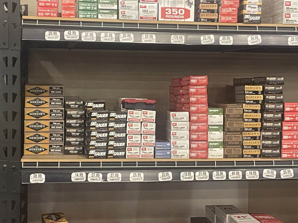 Boxes of ammunition sitting on a shelf