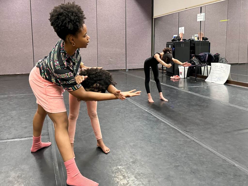 Tiana Sanders teaches dance to young students.