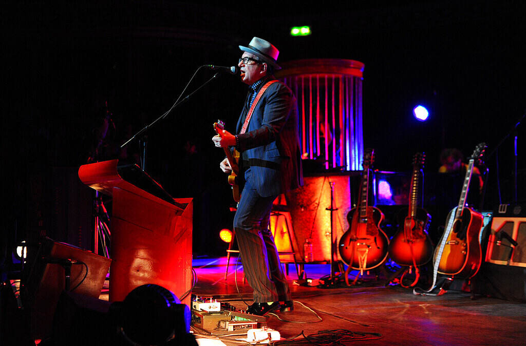 Elvis Costello Elvis Costello performs onstage.