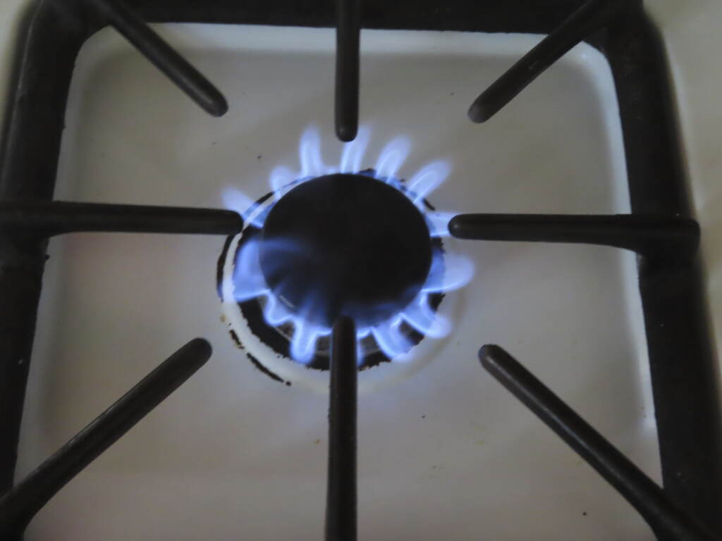 Clean Energy Pushback Gas burner on a stovetop