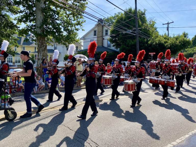 Musicians march in a parade.