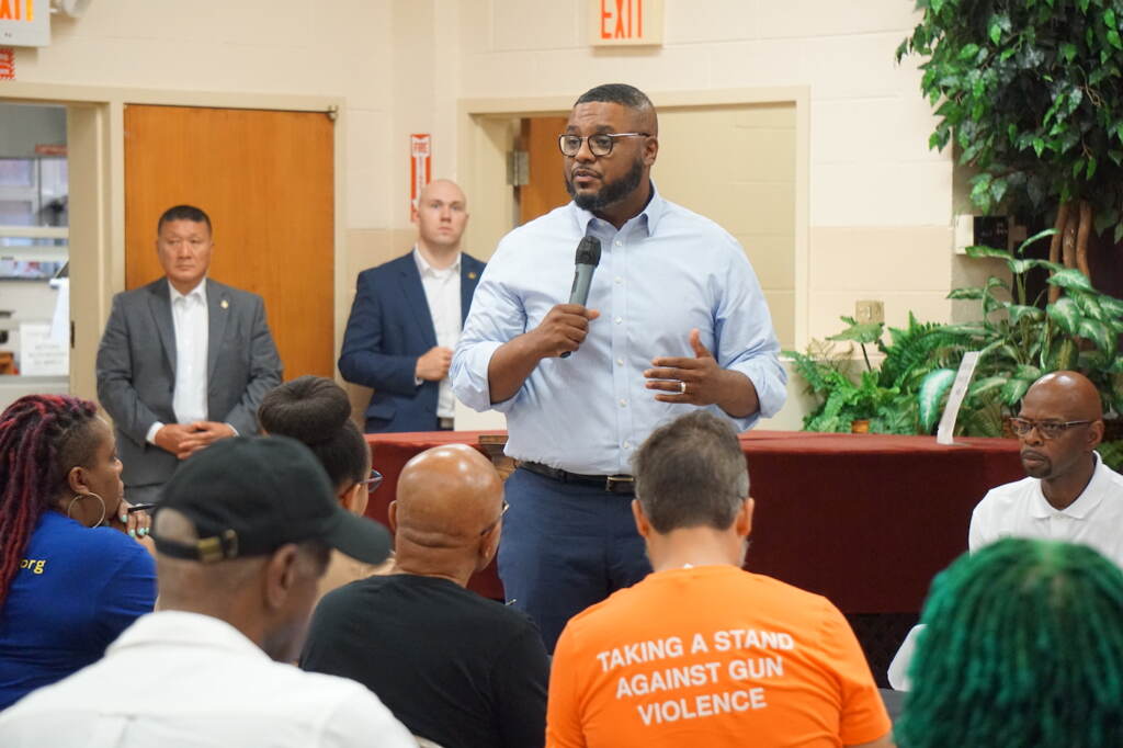 gun-violence-roundtable-s-searles-2023-07-14-6 Austin Davis speaking to the crowd