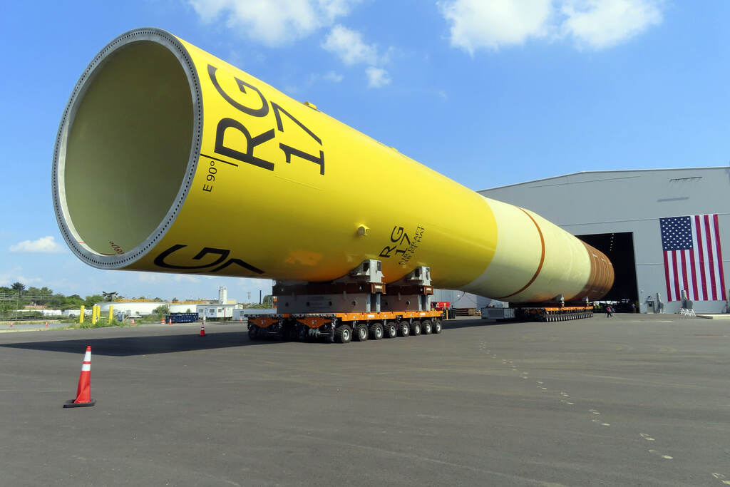 Offshore Wind NJ Litigation A huge foundation for an offshore wind turbine, called a monopile, sits atop wheeled movers in Paulsboro, N.J.