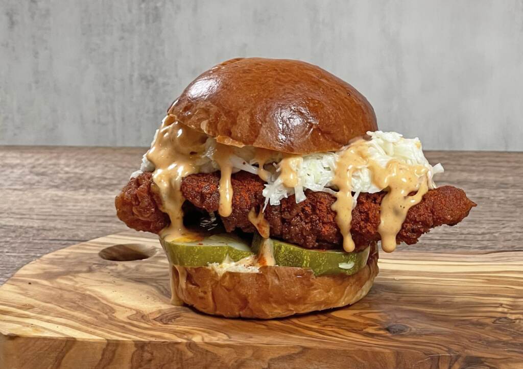 The Nashville-style OK Hot Chicken slider, which is halal, comes with pickles, sauce, and coleslaw, in four levels of spiciness, from mild to ''insane.''