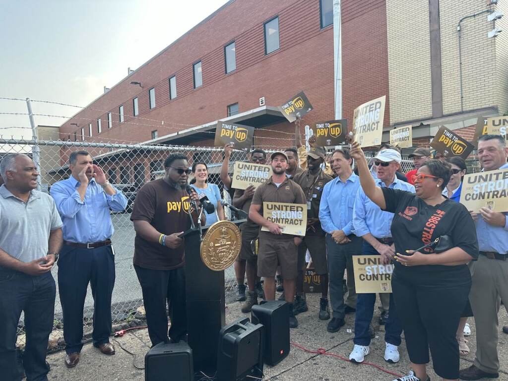 ups-teamsters-2 Richard Hooker Secretary Treasurer of Teamsters Local 623 which represents 5,000 workers across Philadelphia chants with the crowd.