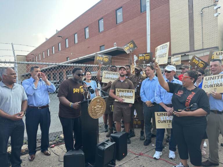 Richard Hooker Secretary Treasurer of Teamsters Local 623 which represents 5,000 workers across Philadelphia chants with the crowd.