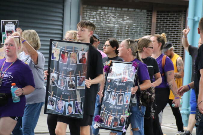 With heavy hearts, people marched down Kensington Ave. in remembrance of those close to them who have passed away from overdoses on Aug. 29, 2023