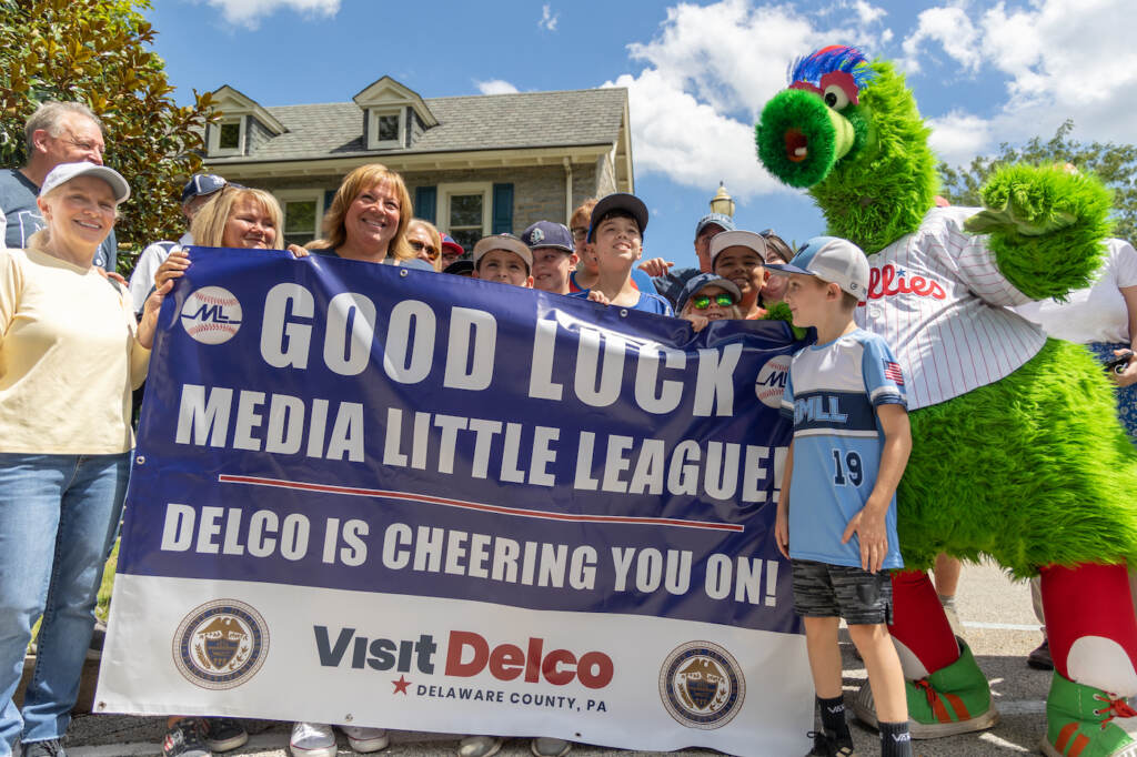 08 16 2023 k paynter media pa. little league team pep rally-4 The Philadelphia Phanatic, official mascot of the city’s MLB team, joined Media Borough residents and officials at Media Borough Hall as they cheered for their 12U baseball team that will complete in the Little League World Series in Williamsport, Pa., on Aug. 16, 2023. (Kimberly Paynter/WHYY)