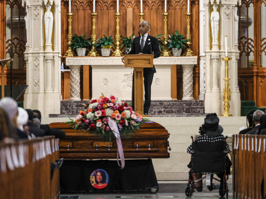 Funeral for N.J. Lt. Gov. Sheila Oliver Rev. Al Sharpton at a podium behind Sheila Oliver's casket