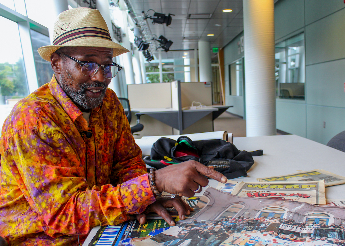 Ogbonna Hagins shows past publications of Philly Word Magazine