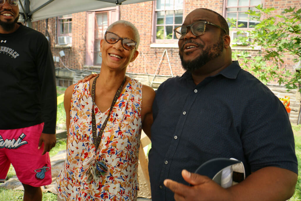 Theresa Shockley and James Wright smile while posing for a photo.