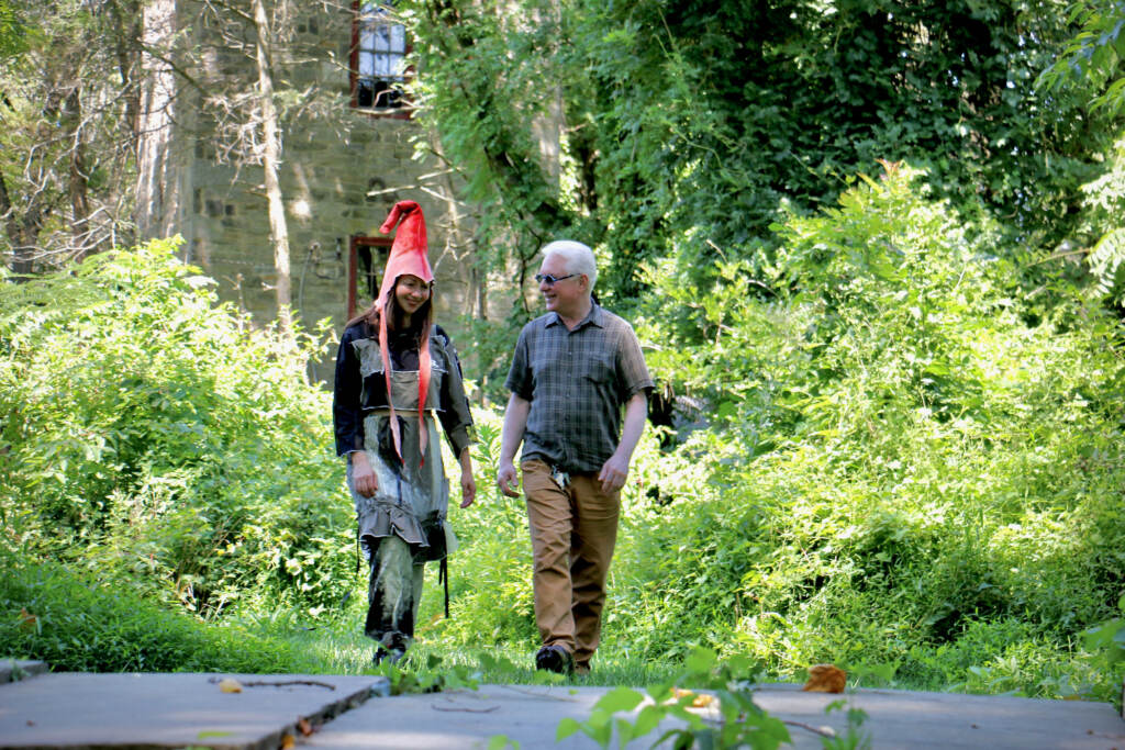 Glen Foerd Executive Director Ross Mitchell strolls the grounds with artist in residence Alex Tatarsky