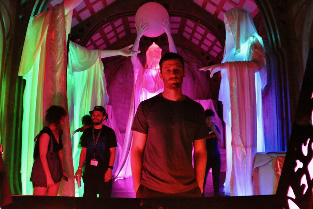 Jordan Renda, creator of Otherworld, stands in one of the more than 50 spaces that make up the immersive art experience