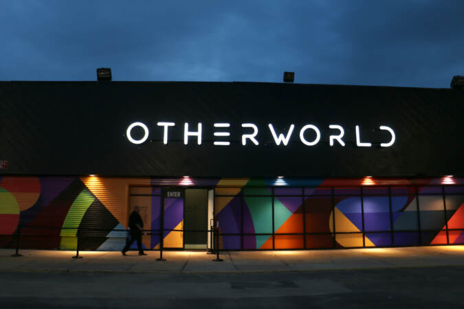 A sign reads Otherworld