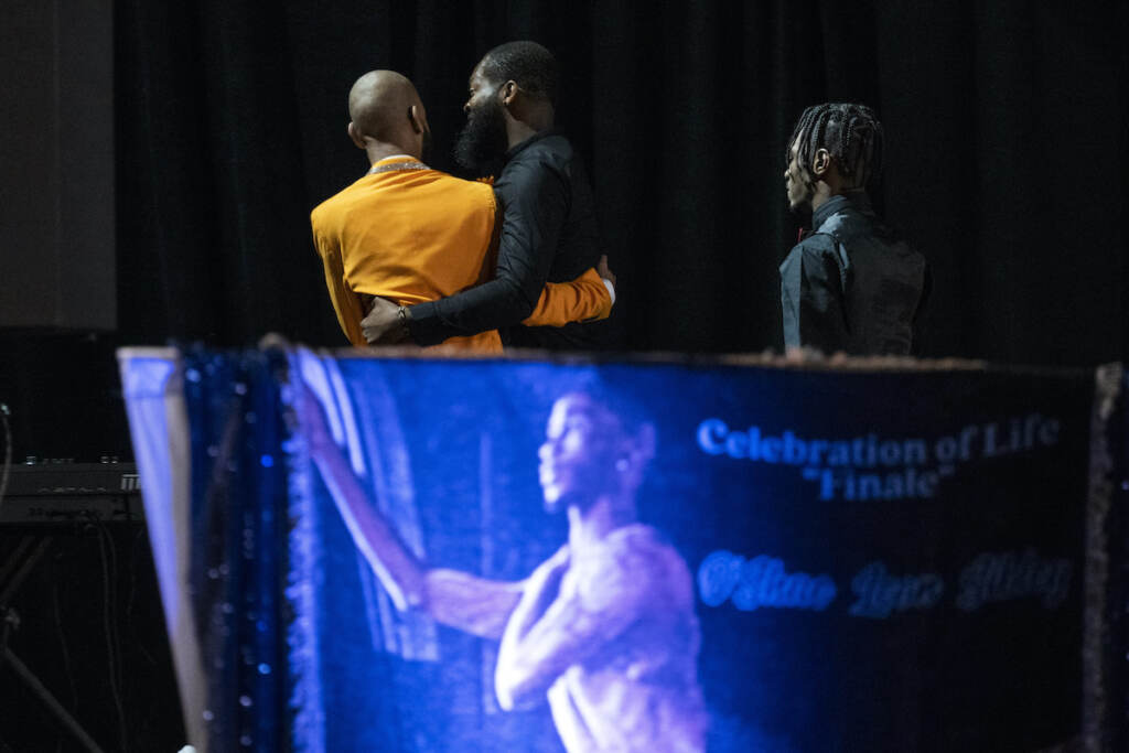 Dancer Stabbed New York Otis Pena (left) a friend of O'Shae Sibley, walks off stage after speaking during a celebration of life for Sibley on Tuesday, Aug. 8, 2023, at The Met Philadelphia, in Philadelphia