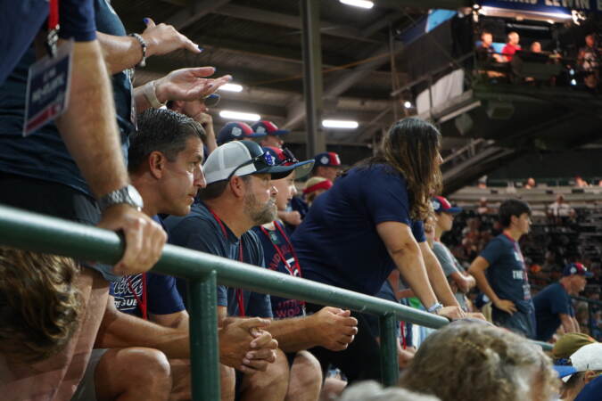 Media Little League's huge crowd of supporters sit quite literally on the edge of their seats at the bottom of the 6th inning.
