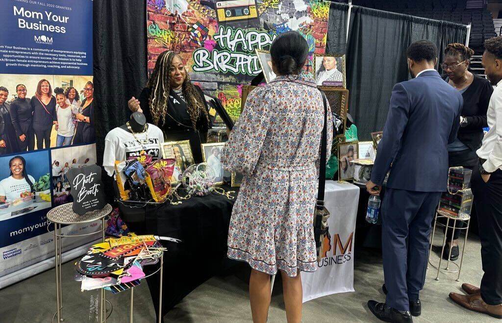 NationalBlackBusinessExpo4 A Brewerytown business development group Mom Your Business listened to attendees at the National Black Business Expo in Philadelphia. (Kristen Mosbrucker-Garza/WHYY)