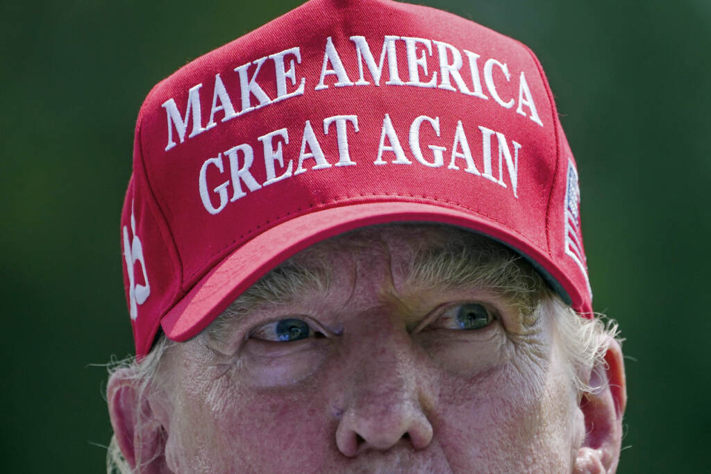 Donald Trump Trump wearing a MAGA hat