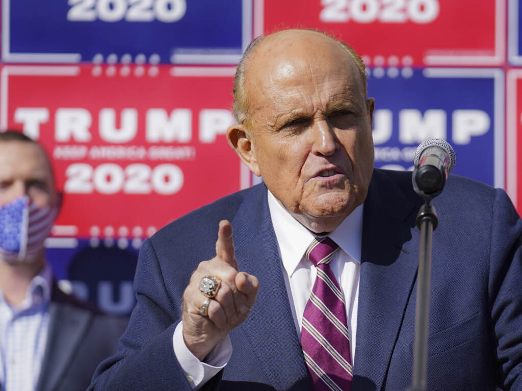 Former New York mayor Rudy Giuliani, a lawyer for President Donald Trump, speaks during a news conference at Four Seasons Total Landscaping on legal challenges to vote counting in Pennsylvania, Nov. 7, 2020, in Philadelphia. Former New York mayor Rudy Giuliani, a lawyer for President Donald Trump, speaks during a news conference at Four Seasons Total Landscaping on legal challenges to vote counting in Pennsylvania, Nov. 7, 2020, in Philadelphia