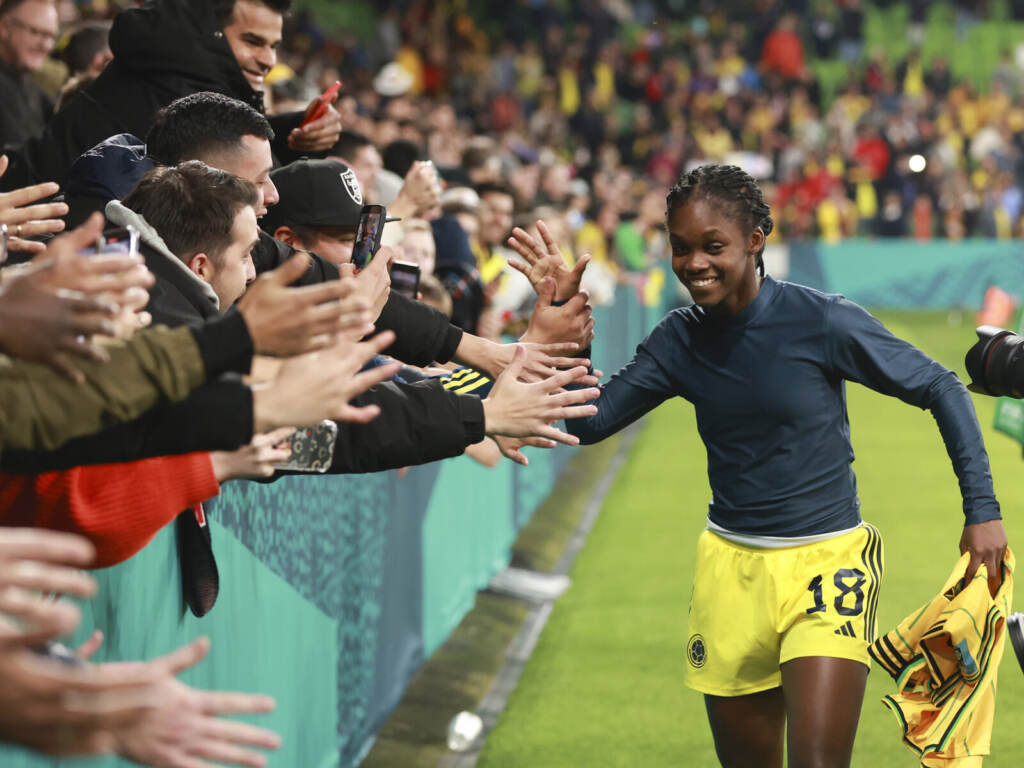 Colombia's 18-year-old Linda Caicedo high-fives fans after a round of 16 win over Jamaica, sending Las Cafeteras to their first Women's World Cup quarterfinal. Hamish Blair/AP