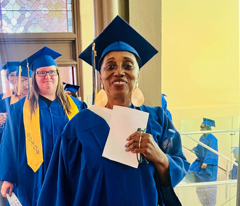 Betty Williams in her graduation cap and gown.