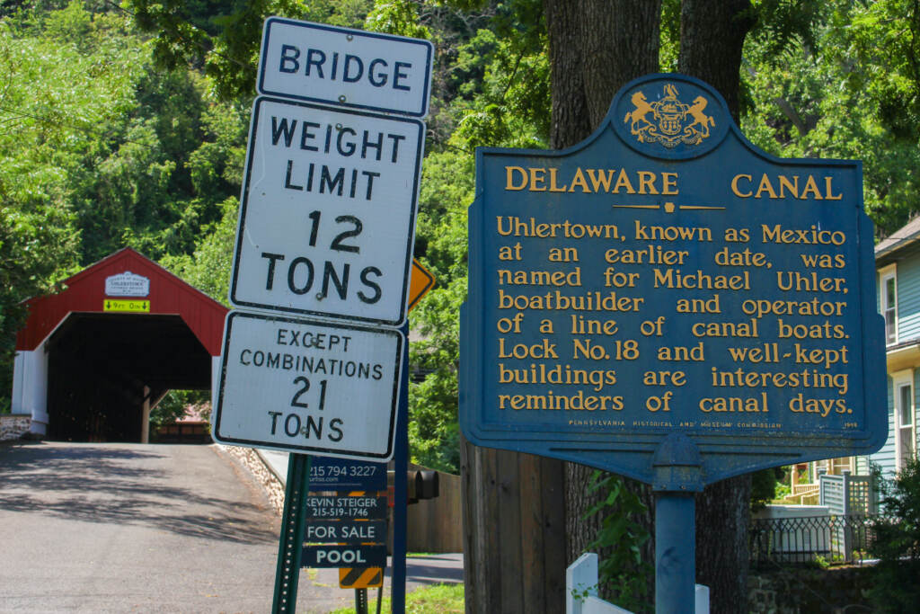 bucks-county-bridges-g-kim-2023-08-09-8-uhlerstown sign A sign about the history of Uhlerstown sits at the entrance of the bridge. (Gina E. Kim/WHYY)