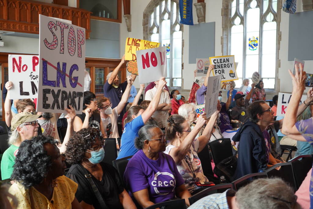 chester-lng-task-force-4 People raise their hands and signs
