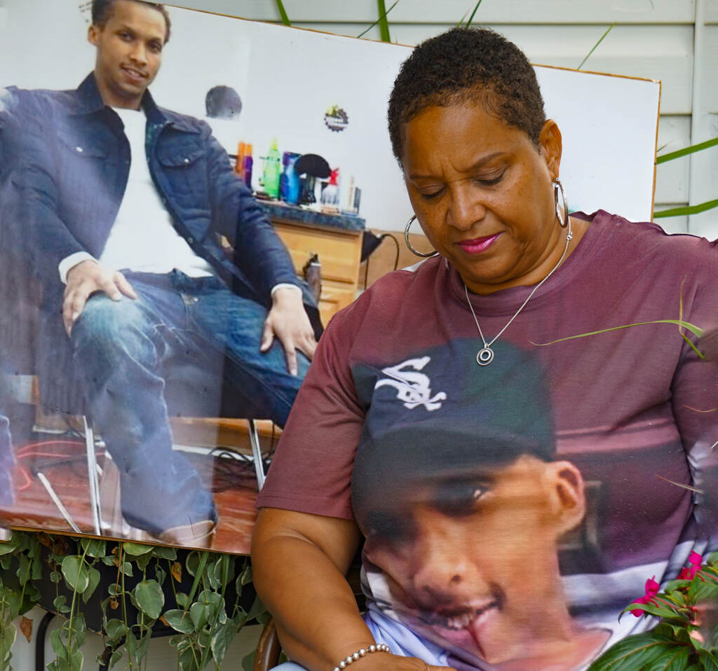 crystal-arthur88-s-searles-2023-08-14 Crystal Arthur with photos of her son Kristian