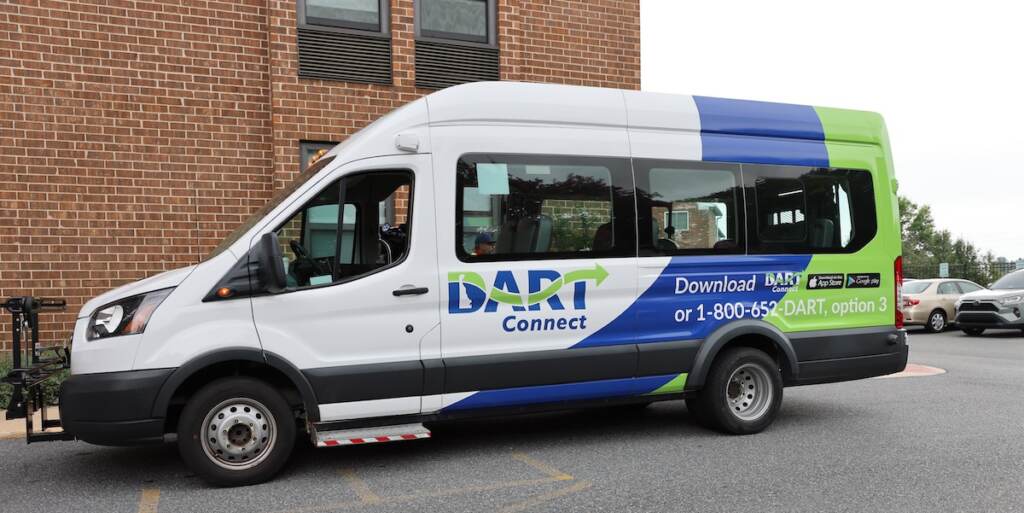 dart-connect A mini-transit bus is shown, with DART Connect written on the side.