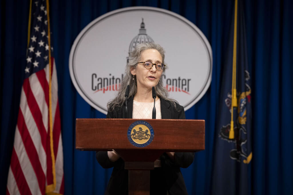 debra-bogen-commonwealth-media-services-2023-08-18 Debra Bogen at a podium
