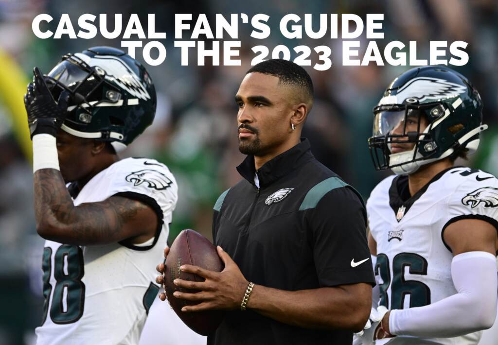 eagles-fan-guide-scaled Philadelphia Eagles quarterback Jalen Hurts, center, watches warm ups before an NFL preseason football game against the Cleveland Browns on Thursday, Aug. 17, 2023, in Philadelphia