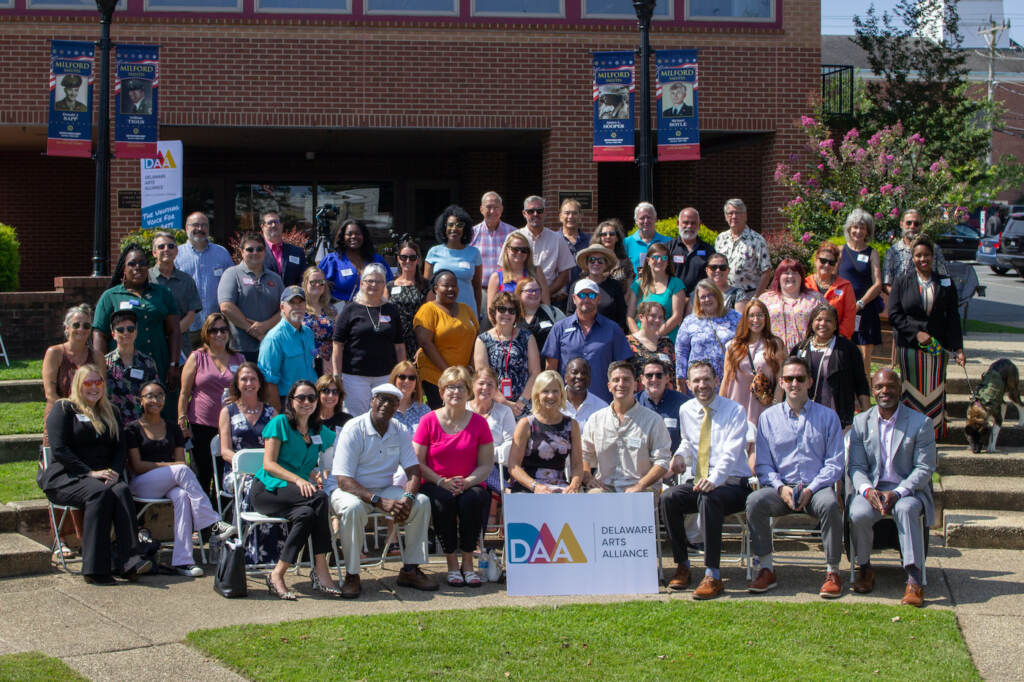milford-library-delaware-arts-alliance-2023-08-22 A group photo of Delaware leaders and artists
