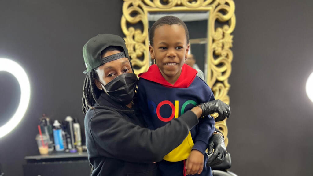 ree-the-barber-with-jackson-erinna—laquista-muh-cropped_custom-949d873575cd11fb54e51cb3e894482cd6586382-s1600-c85 Jackson and his barber, Ree.