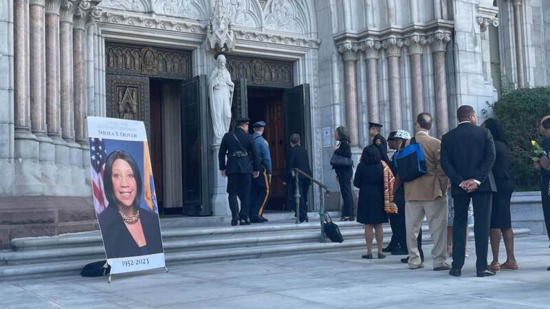 People line up to enter the Cathedral Basilica of the Sacred Heart in Newark for N.J. Lt. Gov. Sheila Oliver’s memorial service on Aug. 12, 2023. (P. Kenneth Burns/WHYY)