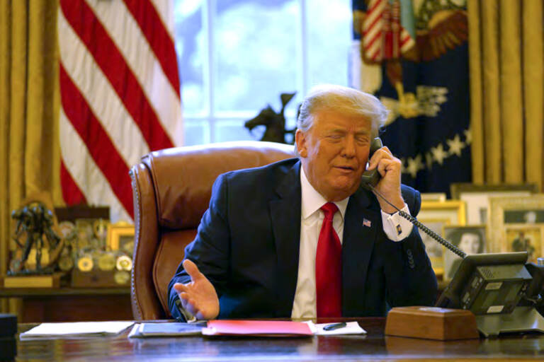 Trump talks to someone on the phone