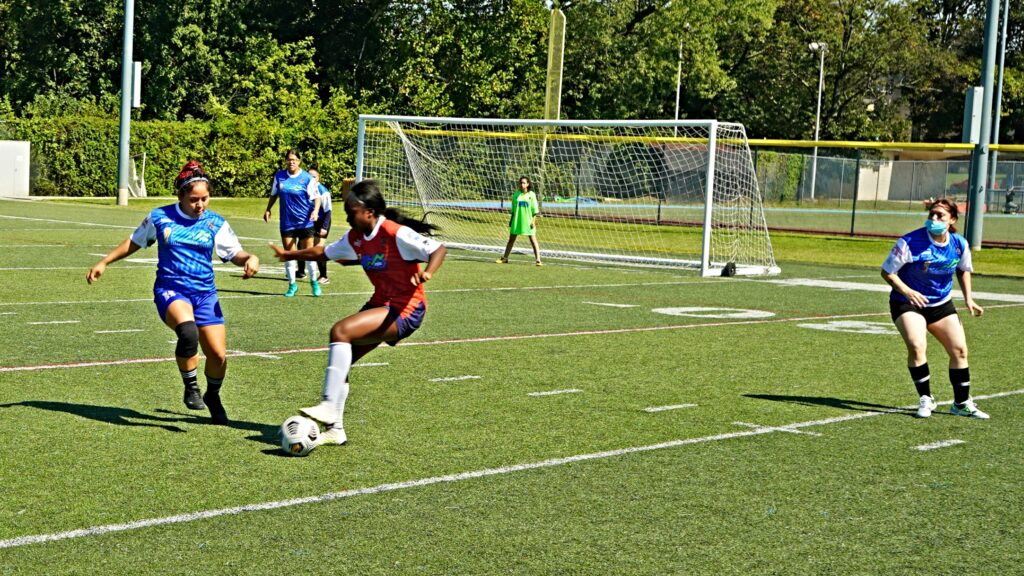 A player for the United States women's team prepares to protect the ball