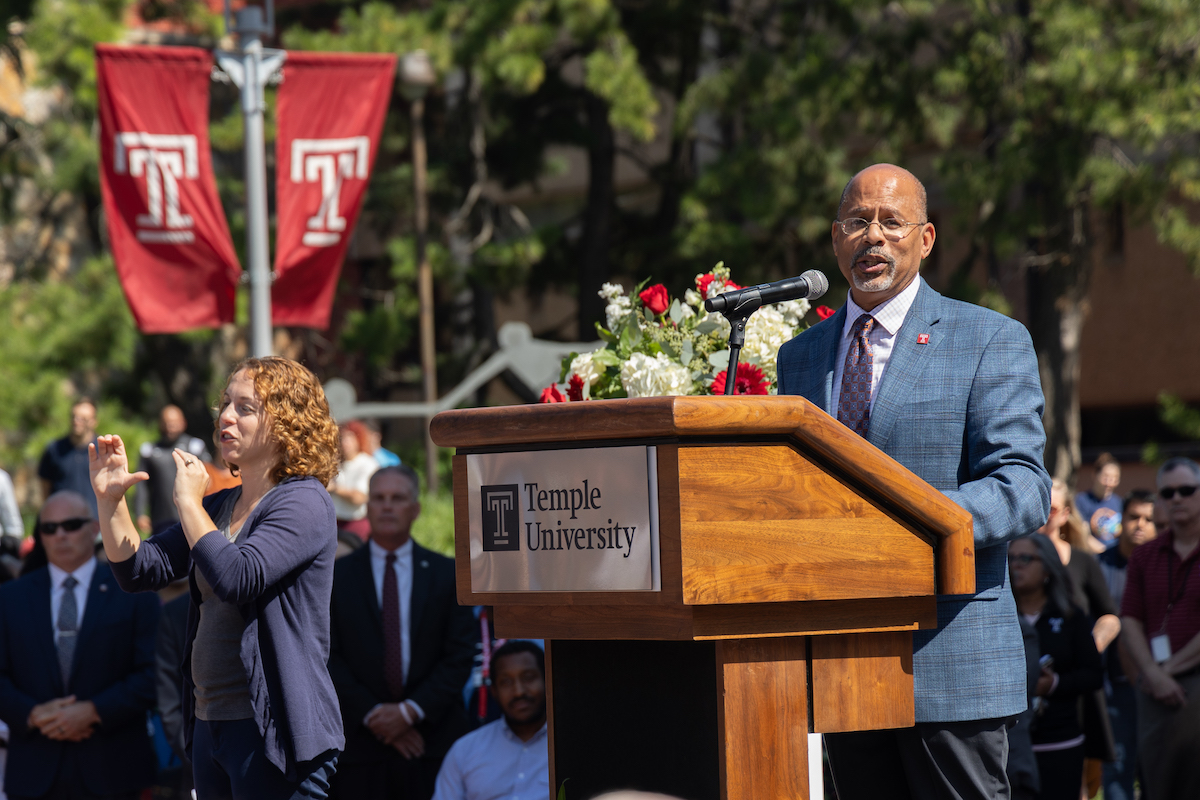 David Brown speaks at a podium.